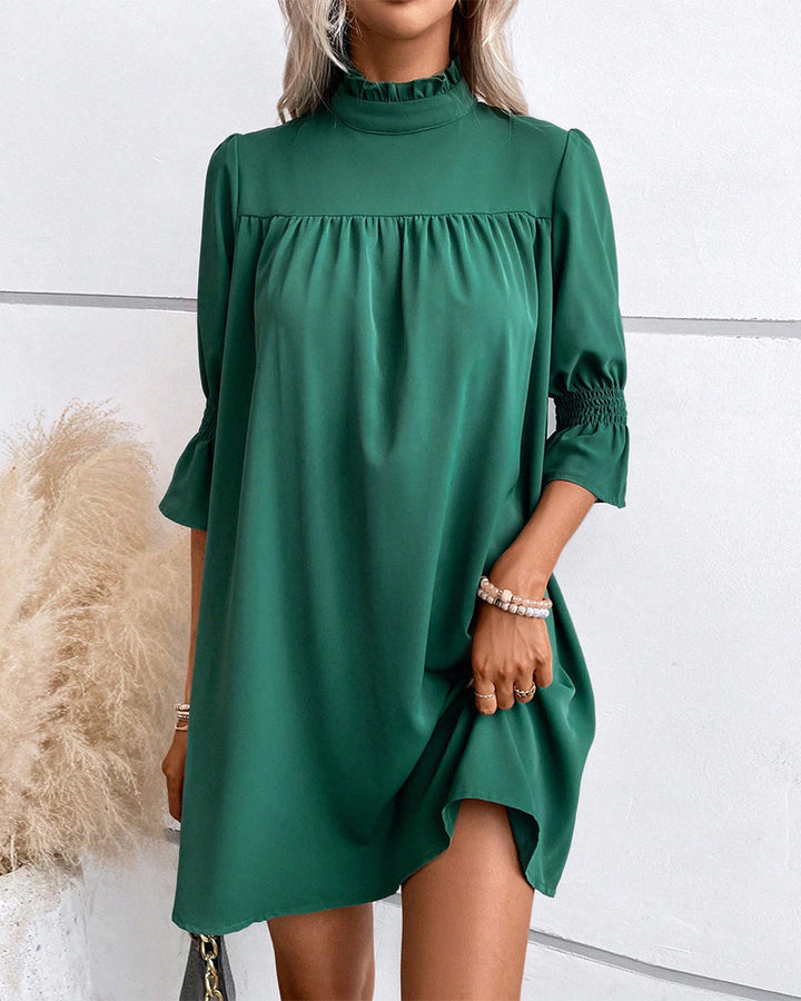 Naomi | Robe chic de couleur unie