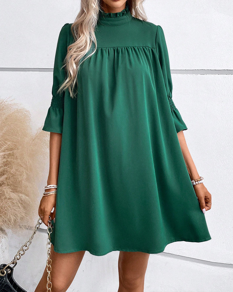 Naomi | Robe chic de couleur unie