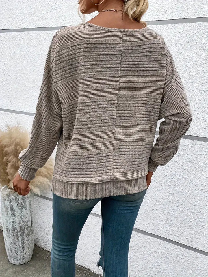 Faye - Élégant pull à col rond et manches chauve-souris à la mode