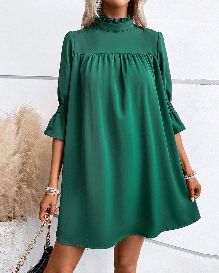 Naomi | Robe chic de couleur unie