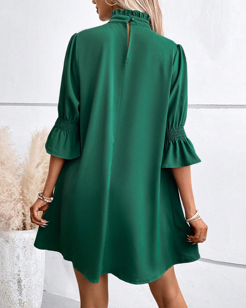 Naomi | Robe chic de couleur unie