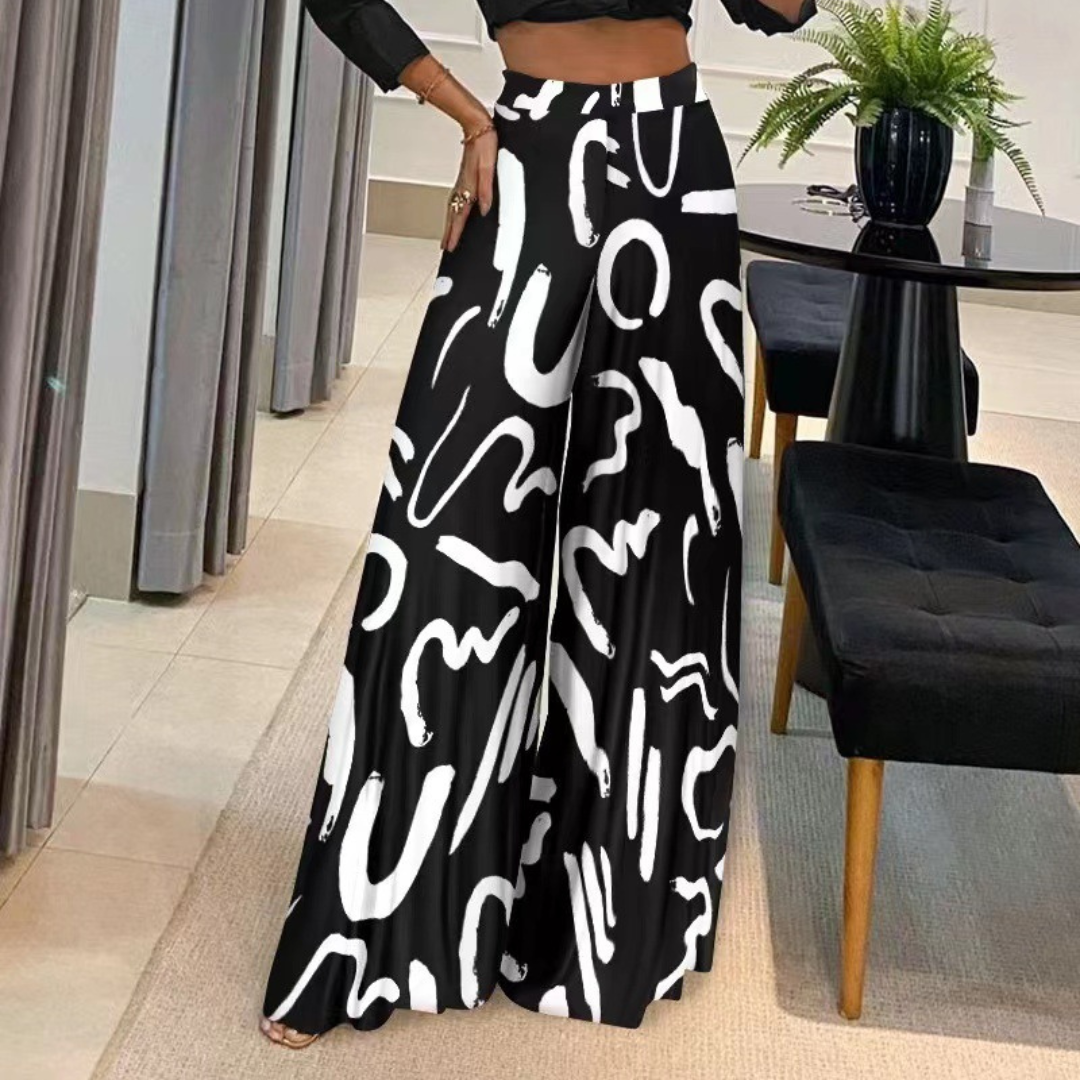 Élégant pantalon de femme en rubis avec un flux artistique et de larges tuyaux