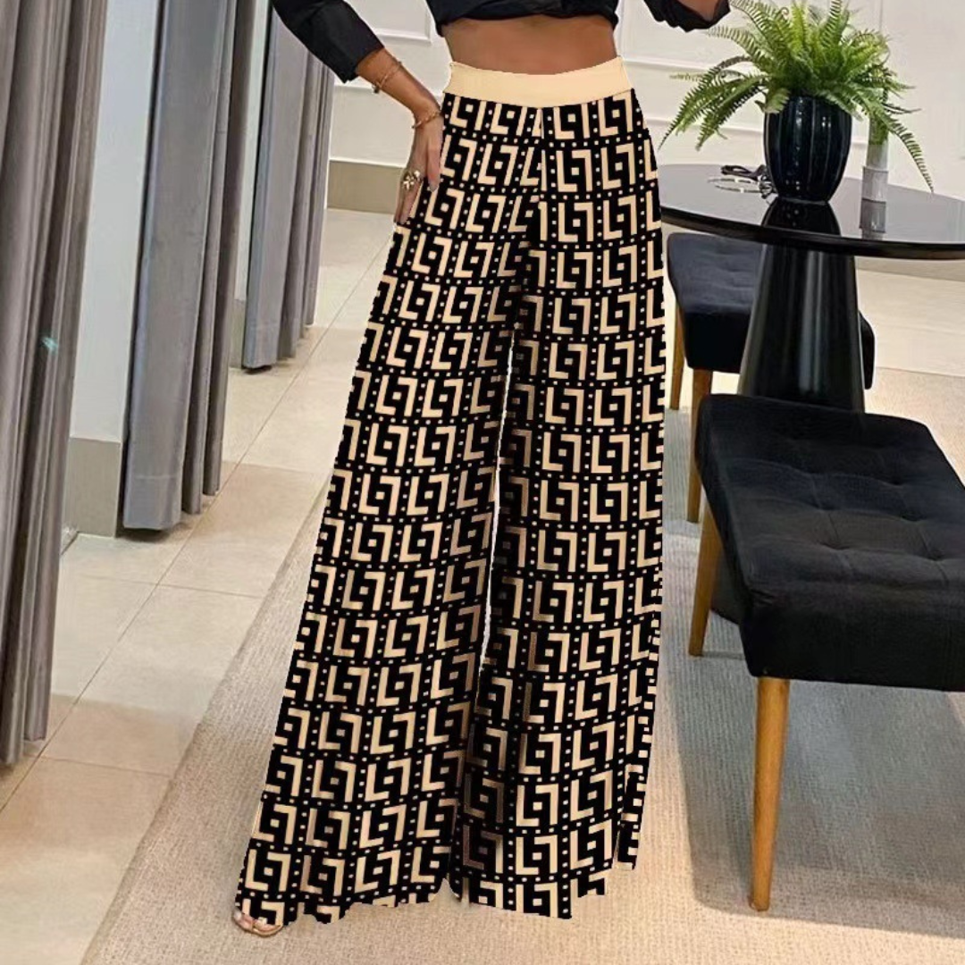 Élégant pantalon de femme en rubis avec un flux artistique et de larges tuyaux