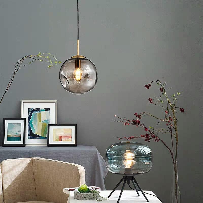 Lampe suspendue à boule en verre de Brikey