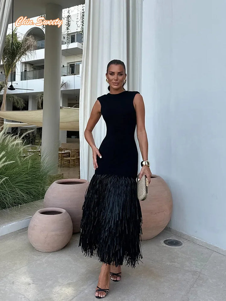 Renne | Robe chic et flatteuse avec pompons ludiques