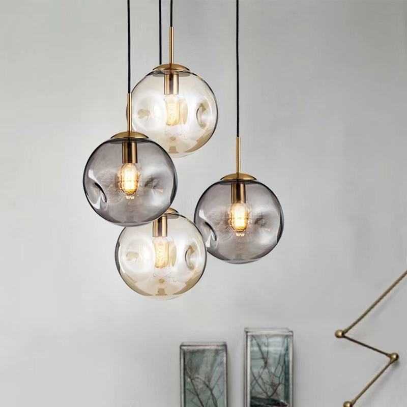 Lampe suspendue à boule en verre de Brikey