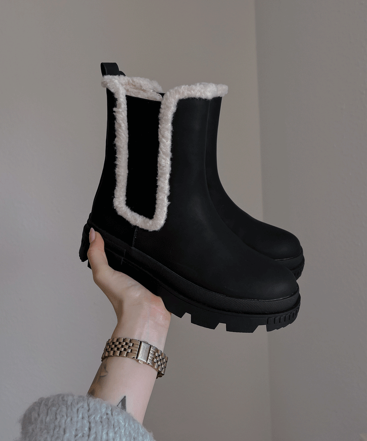 Bottes noires élégantes de Prima