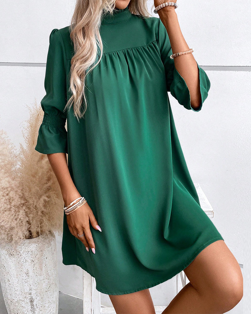 Naomi | Robe chic de couleur unie