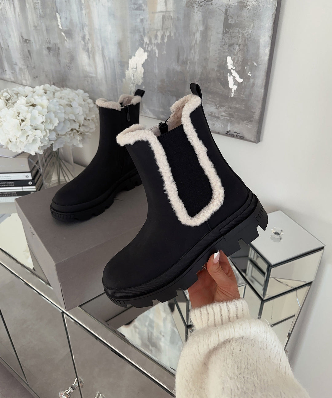 Bottes noires élégantes de Prima