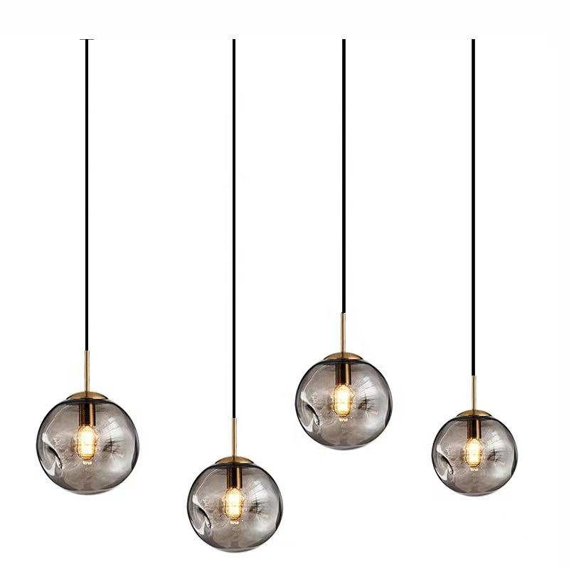 Lampe suspendue à boule en verre de Brikey
